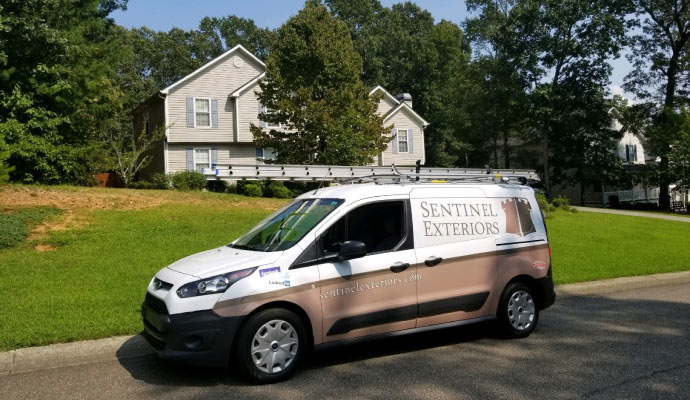 Sentinel Exteriors service vehicle.