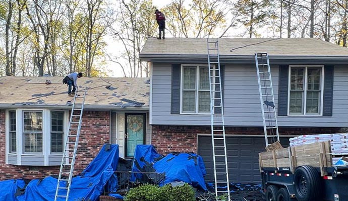 Professional installing a new roof .